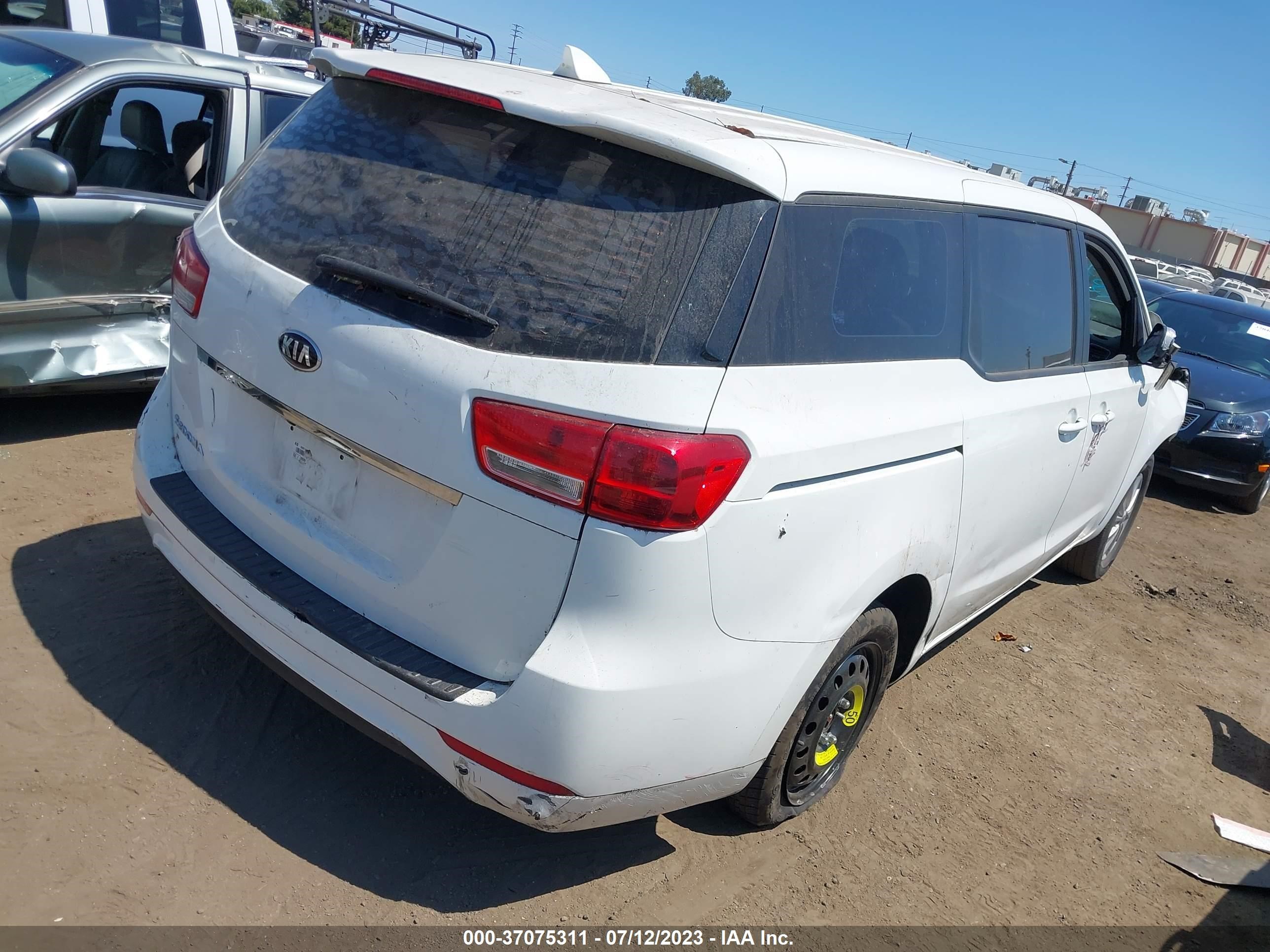 Photo 3 VIN: KNDMA5C12J6393028 - KIA SEDONA 