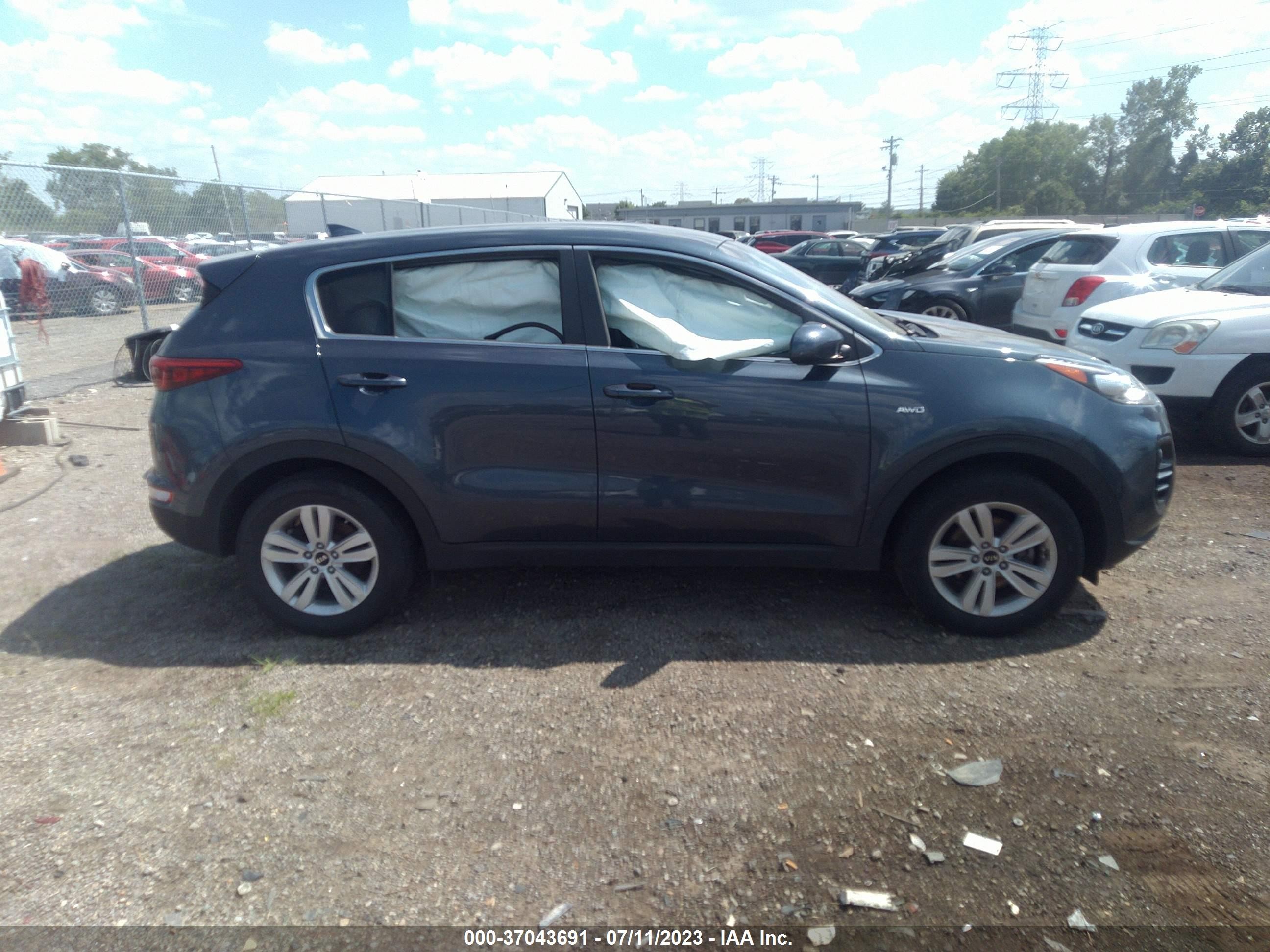 Photo 11 VIN: KNDPMCAC3J7340524 - KIA SPORTAGE 