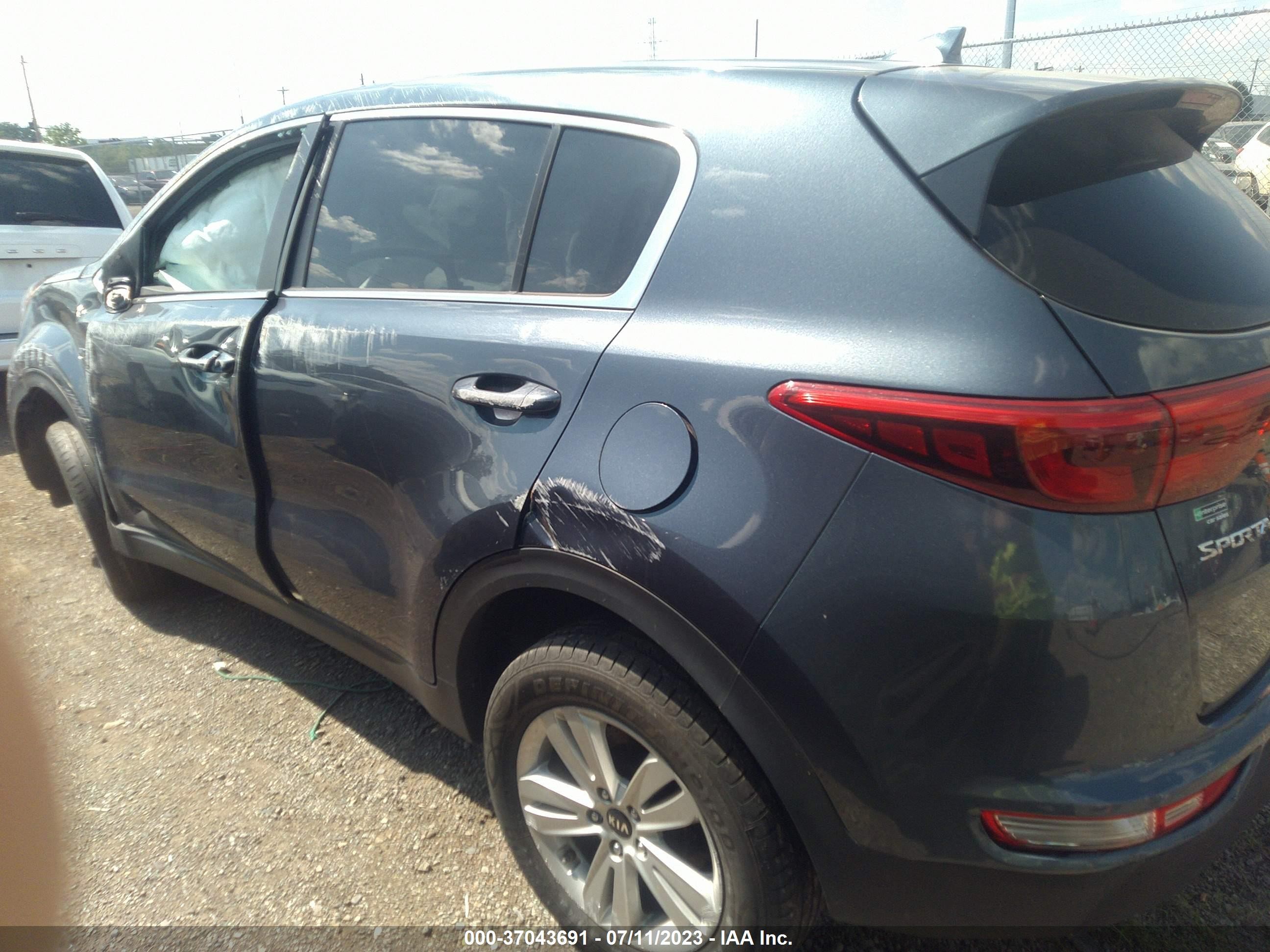 Photo 12 VIN: KNDPMCAC3J7340524 - KIA SPORTAGE 