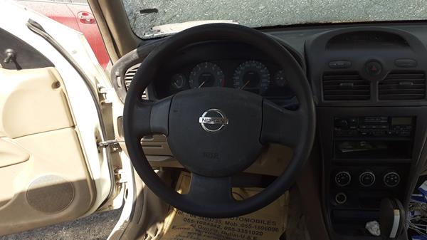 Photo 11 VIN: KNMCC42H59P736886 - NISSAN SUNNY 