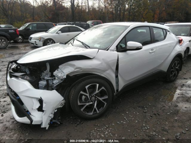 Photo 1 VIN: NMTKHMBX1MR129336 - TOYOTA C-HR 