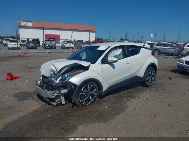 Photo 1 VIN: NMTKHMBX2JR051998 - TOYOTA C-HR 