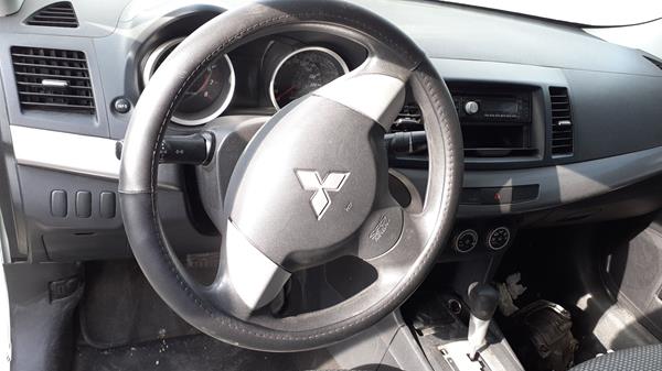 Photo 11 VIN: RKMGS41L0EY042779 - MITSUBISHI LANCER 