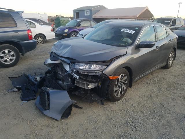 Photo 1 VIN: SHHFK7H21JU400556 - HONDA CIVIC LX 