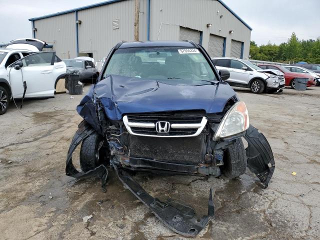 Photo 4 VIN: SHSRD68403U104766 - HONDA CR-V LX 