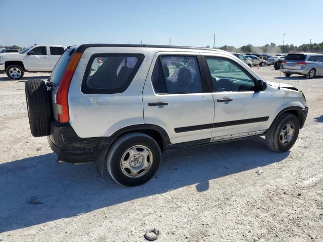 Photo 2 VIN: SHSRD68413U101570 - HONDA CR-V LX 