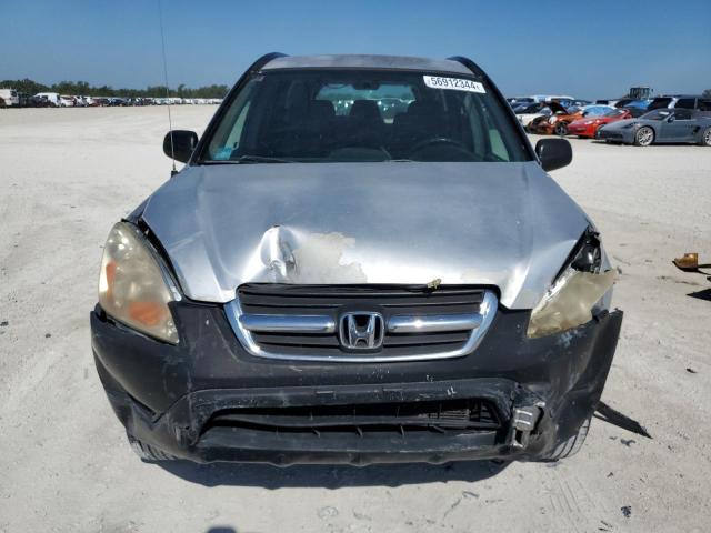 Photo 4 VIN: SHSRD68413U101570 - HONDA CR-V LX 