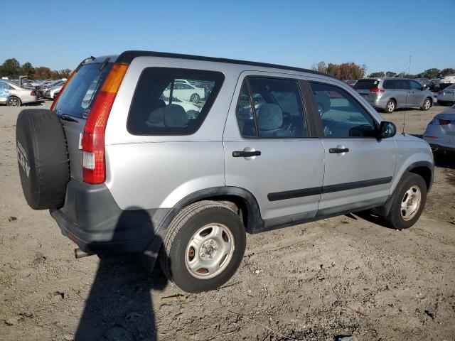 Photo 2 VIN: SHSRD68494U209565 - HONDA CR-V LX 