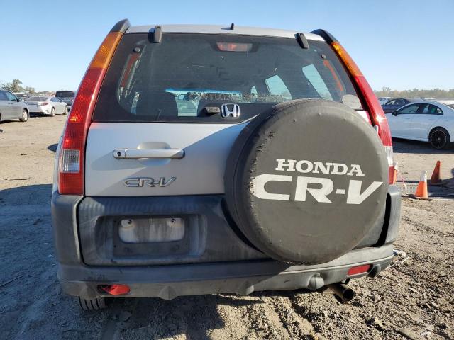 Photo 5 VIN: SHSRD68494U209565 - HONDA CR-V LX 