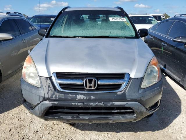 Photo 4 VIN: SHSRD684X4U200776 - HONDA CR-V LX 