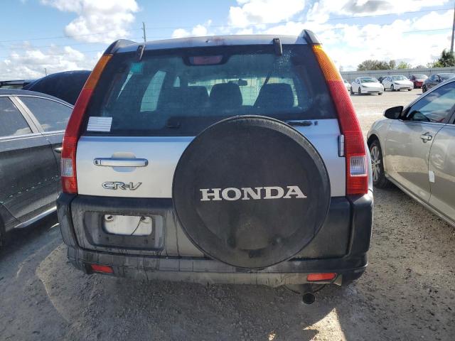 Photo 5 VIN: SHSRD684X4U200776 - HONDA CR-V LX 