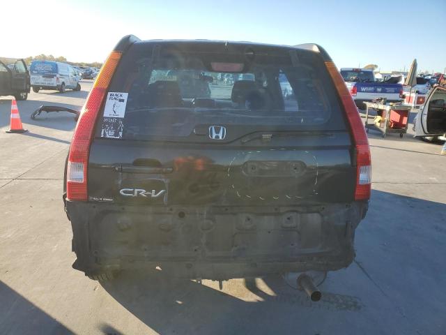 Photo 5 VIN: SHSRD684X4U202026 - HONDA CR-V LX 