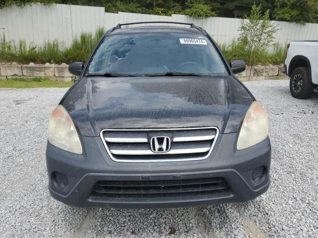 Photo 4 VIN: SHSRD68505U304865 - HONDA CR-V LX 