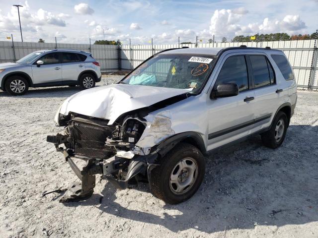 Photo 1 VIN: SHSRD78504U210988 - HONDA CR-V LX 