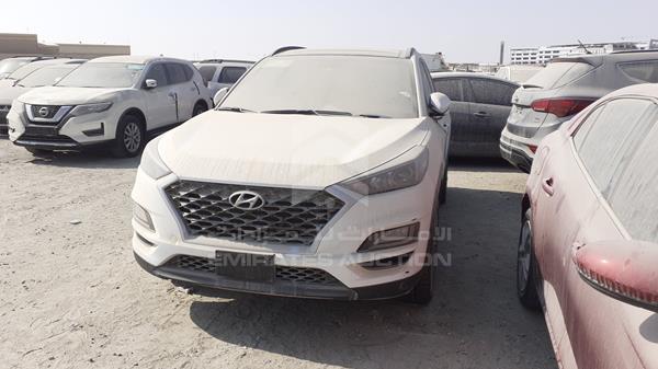 Photo 4 VIN: TMAJ28112KJ789872 - HYUNDAI TUCSON 