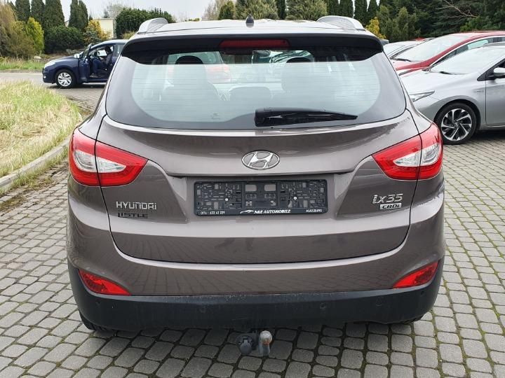 Photo 10 VIN: TMAJU81UAEJ628421 - HYUNDAI IX35 SUV 