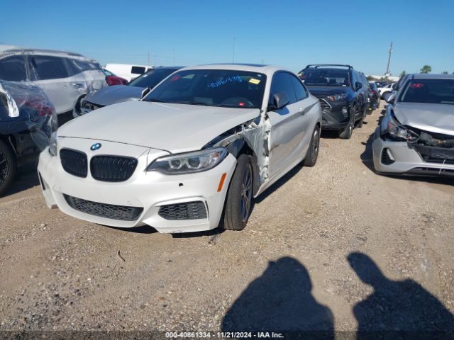 Photo 1 VIN: WBA1J7C51GV359577 - BMW M235I 