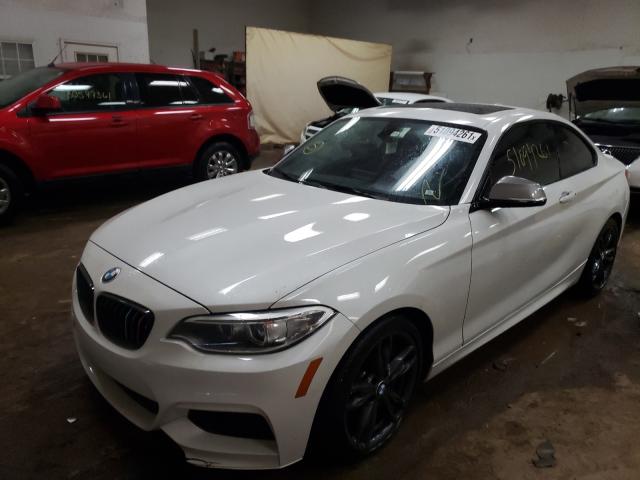 Photo 1 VIN: WBA1J7C51GV359837 - BMW M235I 