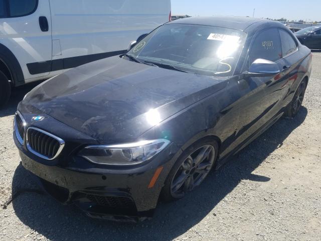 Photo 1 VIN: WBA1J7C55GV359582 - BMW M235I 