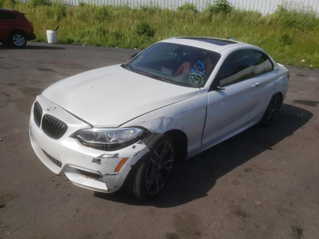 Photo 1 VIN: WBA1J9C59FV371115 - BMW M235XI 