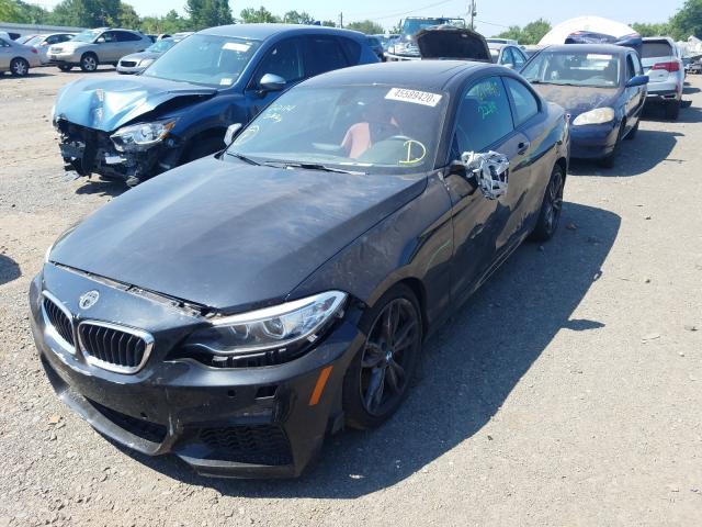 Photo 1 VIN: WBA1J9C59FVX99055 - BMW M235XI 