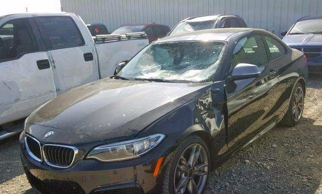 Photo 1 VIN: WBA1J9C59GV696056 - BMW M235XI 