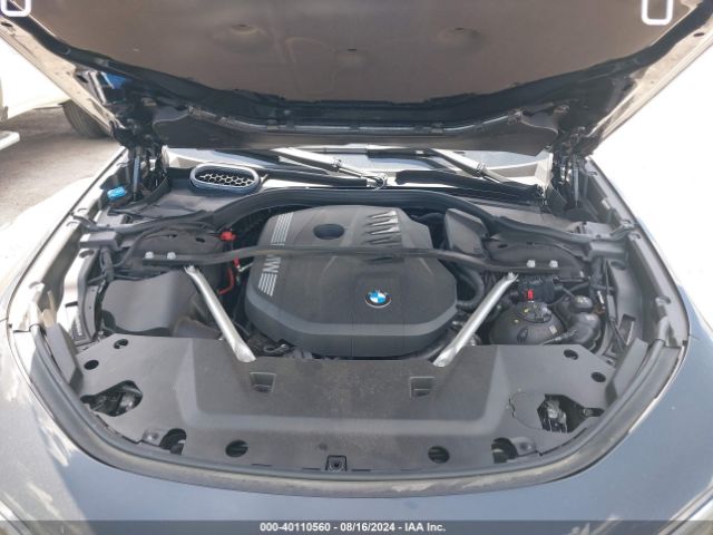 Photo 9 VIN: WBA23EH04PCN49448 - BMW 740I 