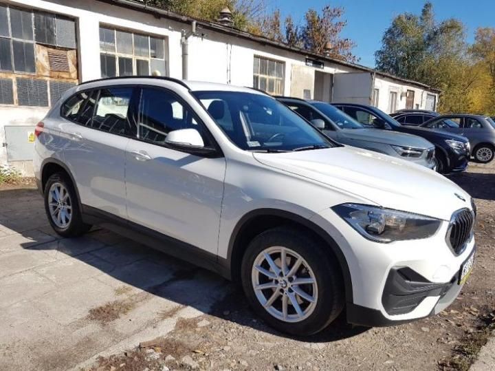 Photo 4 VIN: WBA31AA0305P02845 - BMW X1 SUV 