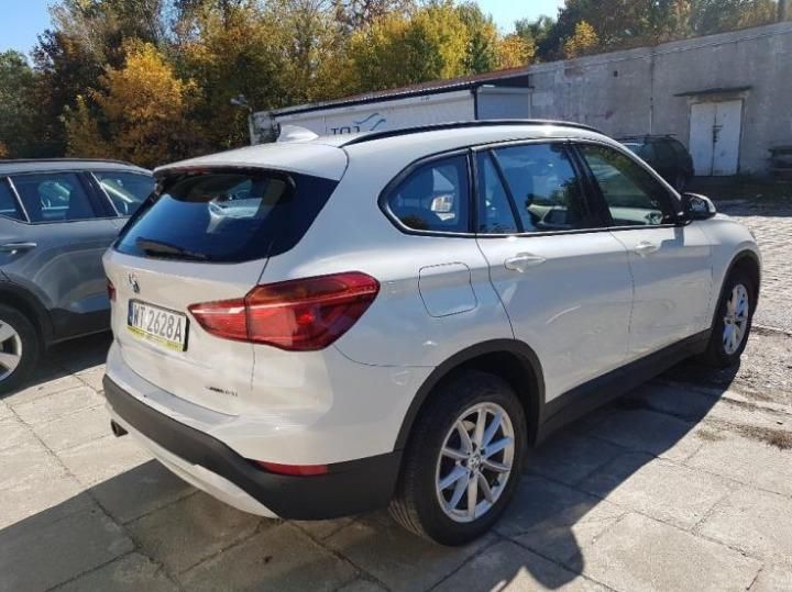 Photo 5 VIN: WBA31AA0305P02845 - BMW X1 SUV 