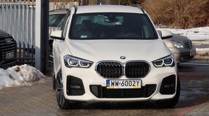 Photo 4 VIN: WBA31AA0X05U83849 - BMW X1 SUV 