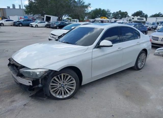 Photo 1 VIN: WBA3A5C57EP603327 - BMW 3 SERIES 