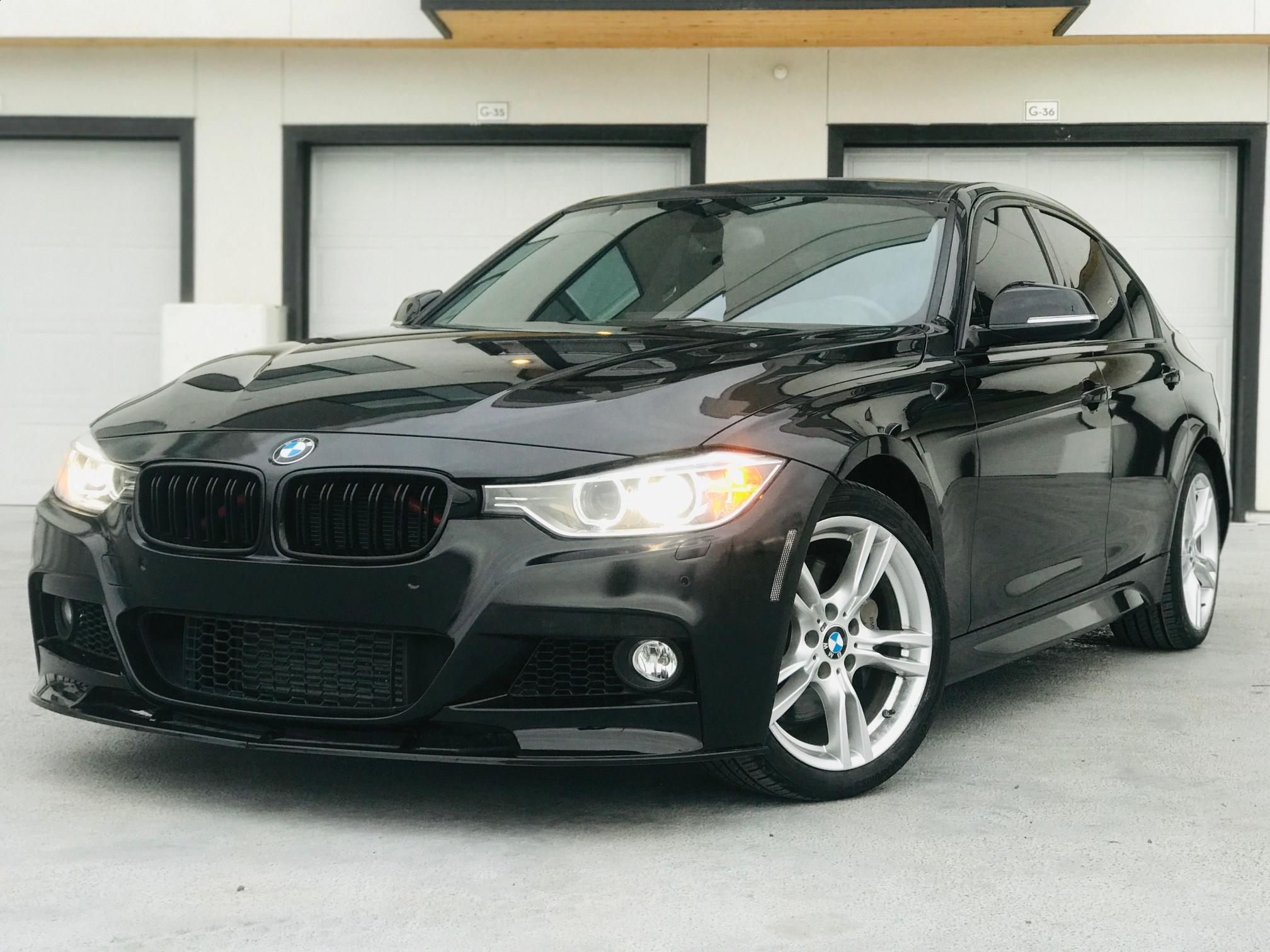 Photo 1 VIN: WBA3A9G5XFNS66523 - BMW 335I 