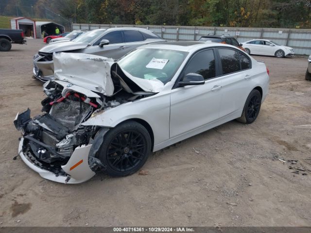 Photo 1 VIN: WBA3B1C52FK138587 - BMW 320I 