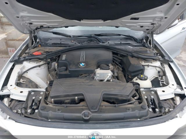 Photo 9 VIN: WBA3B1C5XFK141110 - BMW 320I 