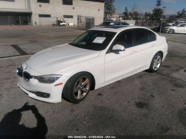 Photo 1 VIN: WBA3B1G52ENS77979 - BMW 320I 