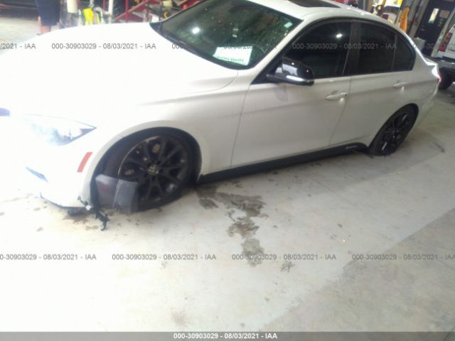 Photo 5 VIN: WBA3B1G53ENT00184 - BMW 3 