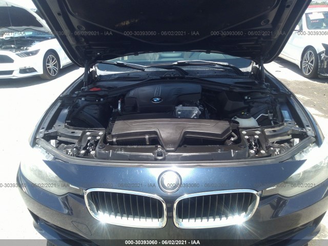 Photo 9 VIN: WBA3B1G53ENT00878 - BMW 3 