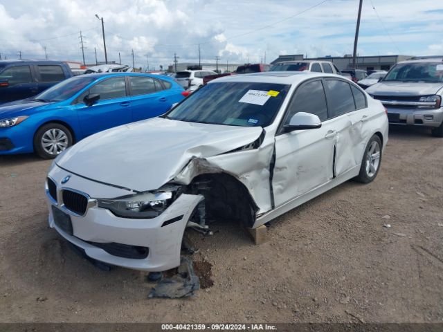 Photo 1 VIN: WBA3B1G5XFNT04153 - BMW 320I 