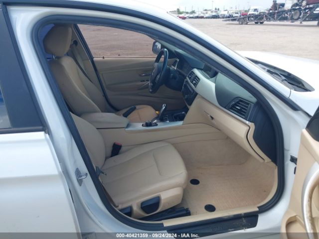 Photo 4 VIN: WBA3B1G5XFNT04153 - BMW 320I 