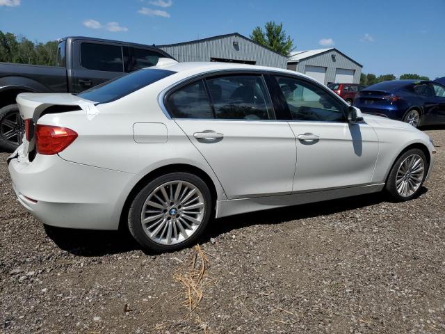 Photo 2 VIN: WBA3B3C5XEJ980173 - BMW 328 XI 