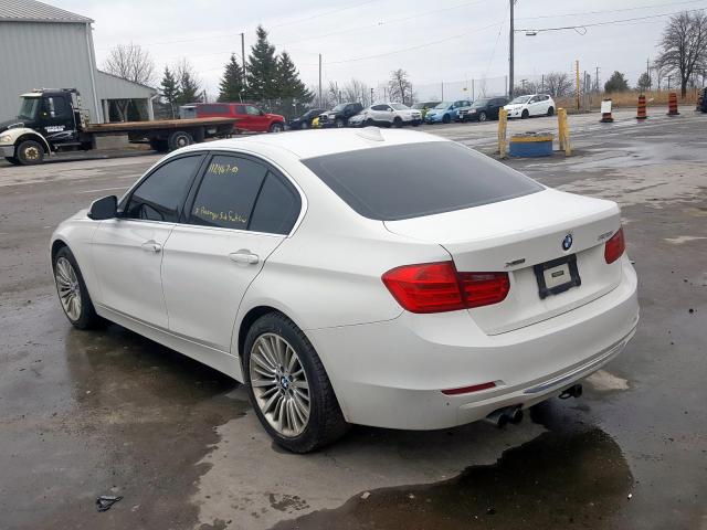 Photo 2 VIN: WBA3B3C5XEJ982098 - BMW 328 XI 