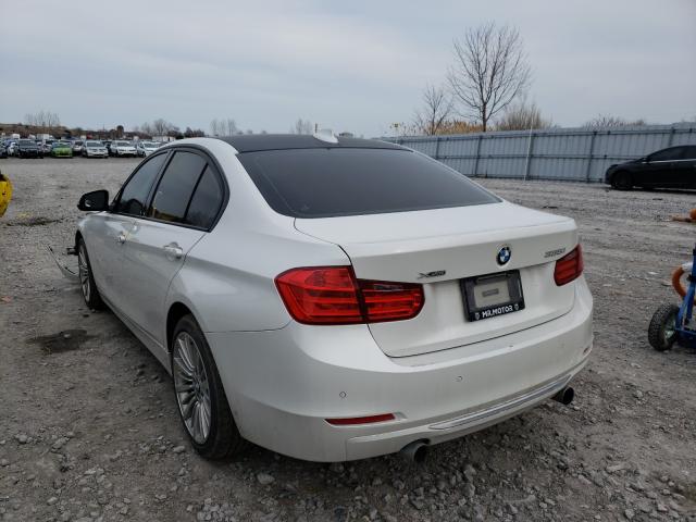 Photo 2 VIN: WBA3B9C57DF585386 - BMW 335XI 