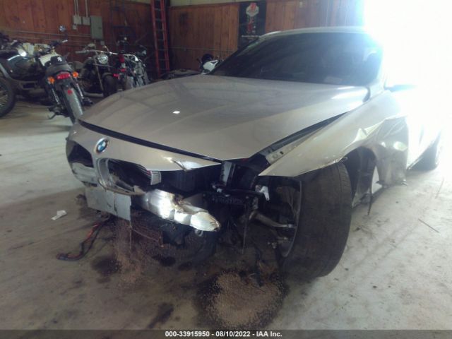 Photo 5 VIN: WBA3B9G50ENR91009 - BMW 3 SERIES 