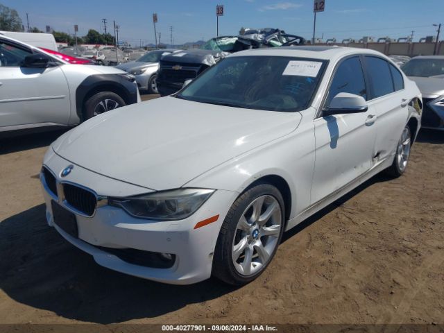 Photo 1 VIN: WBA3B9G50FNR93179 - BMW 335I 