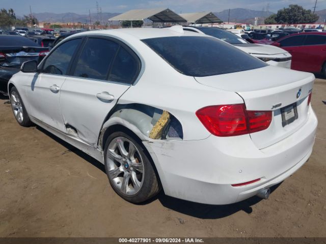 Photo 2 VIN: WBA3B9G50FNR93179 - BMW 335I 