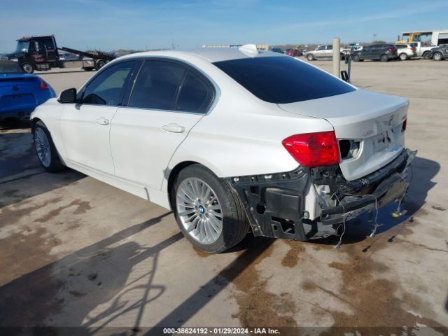 Photo 2 VIN: WBA3B9G54ENR92079 - BMW 335I 