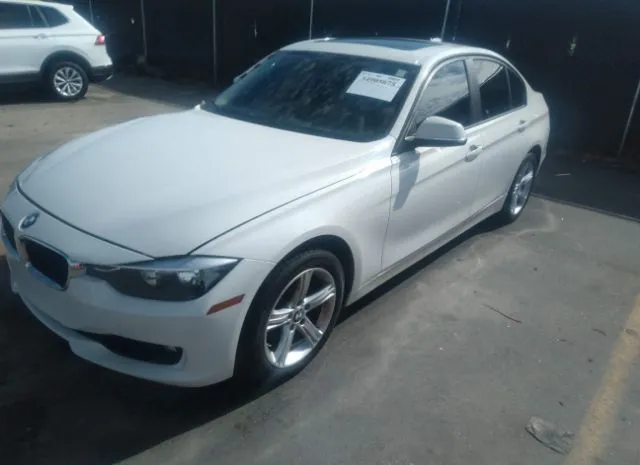 Photo 1 VIN: WBA3C1C5XEK106448 - BMW 3 SERIES 