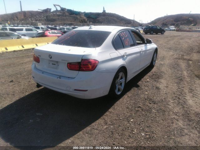 Photo 3 VIN: WBA3C3C50DF981671 - BMW 320I 