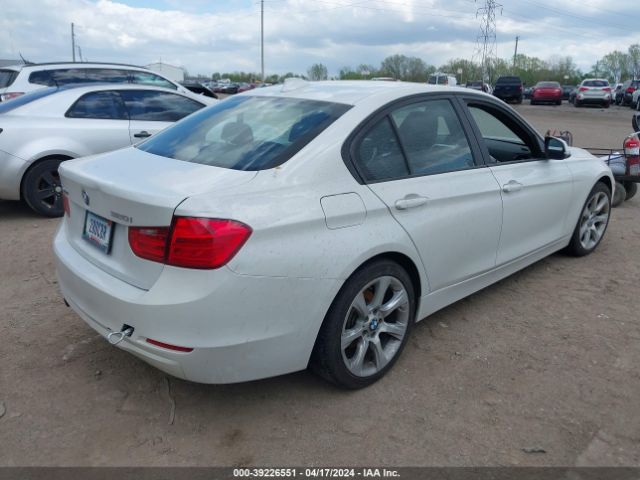 Photo 3 VIN: WBA3C3G53ENS71875 - BMW 320I 