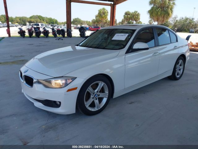 Photo 1 VIN: WBA3C3G5XENR25559 - BMW 320I 